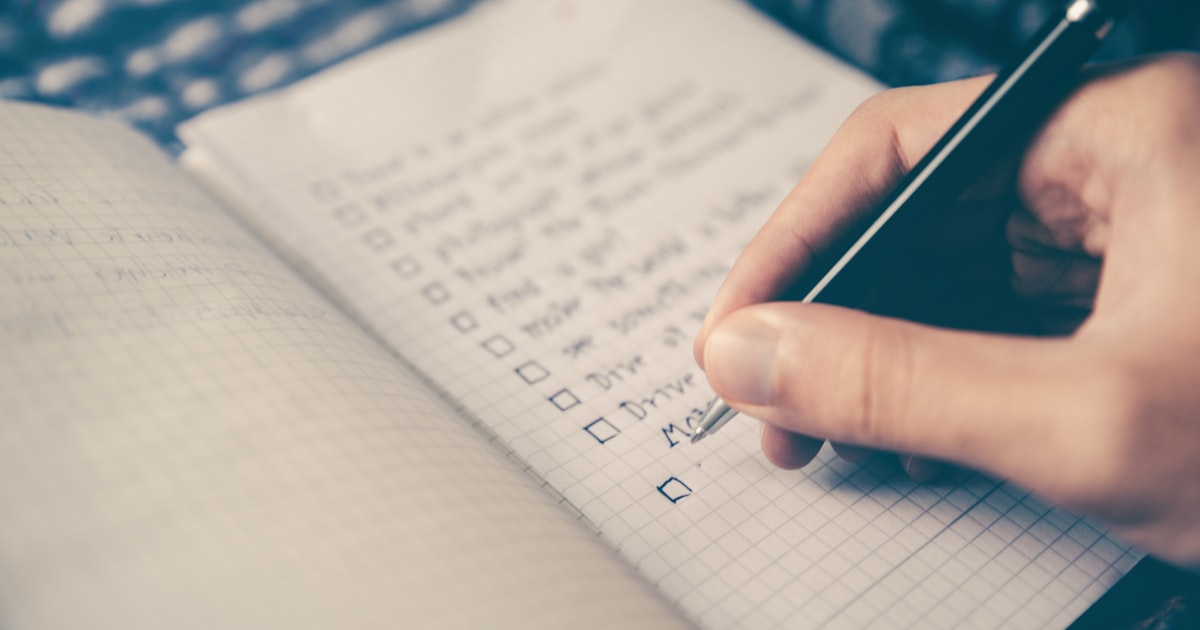Notebook and pen for goal planning and tracking