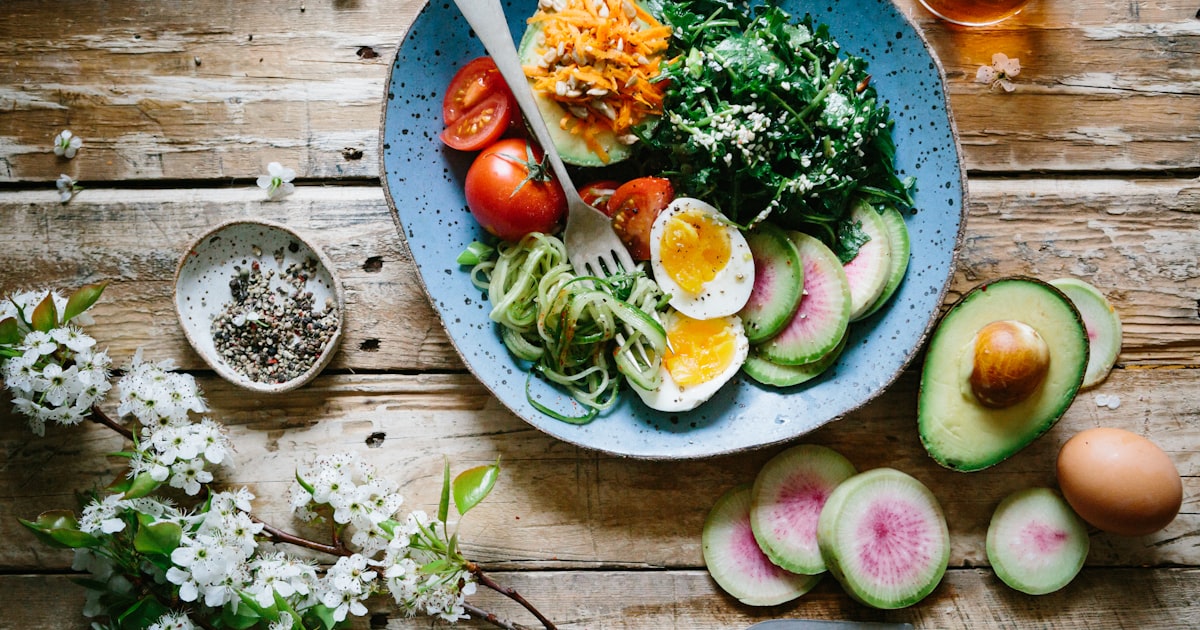 A colorful spread of balanced meals with proteins, carbs, and healthy fats